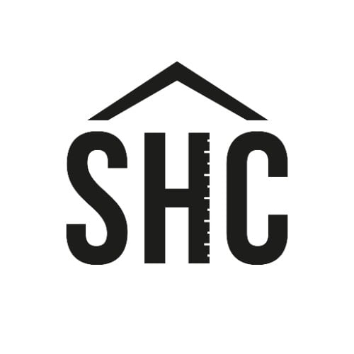 letters 'SHC' with lines symbolising a roof over the letters