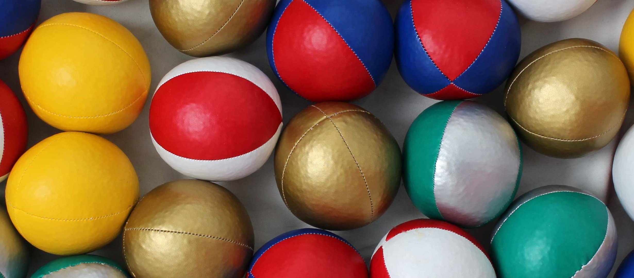 A pile of coloured juggling balls