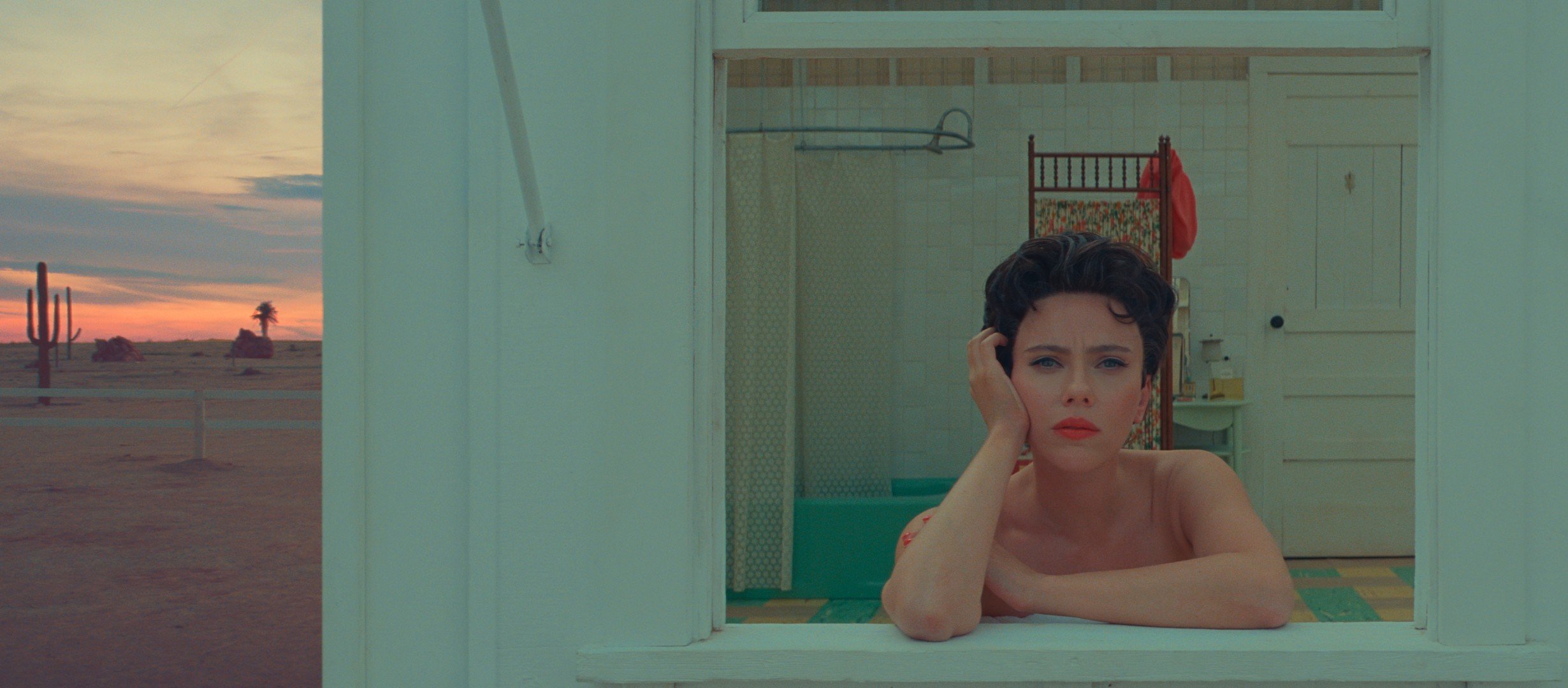 Scarlett Johansson looking out of a window