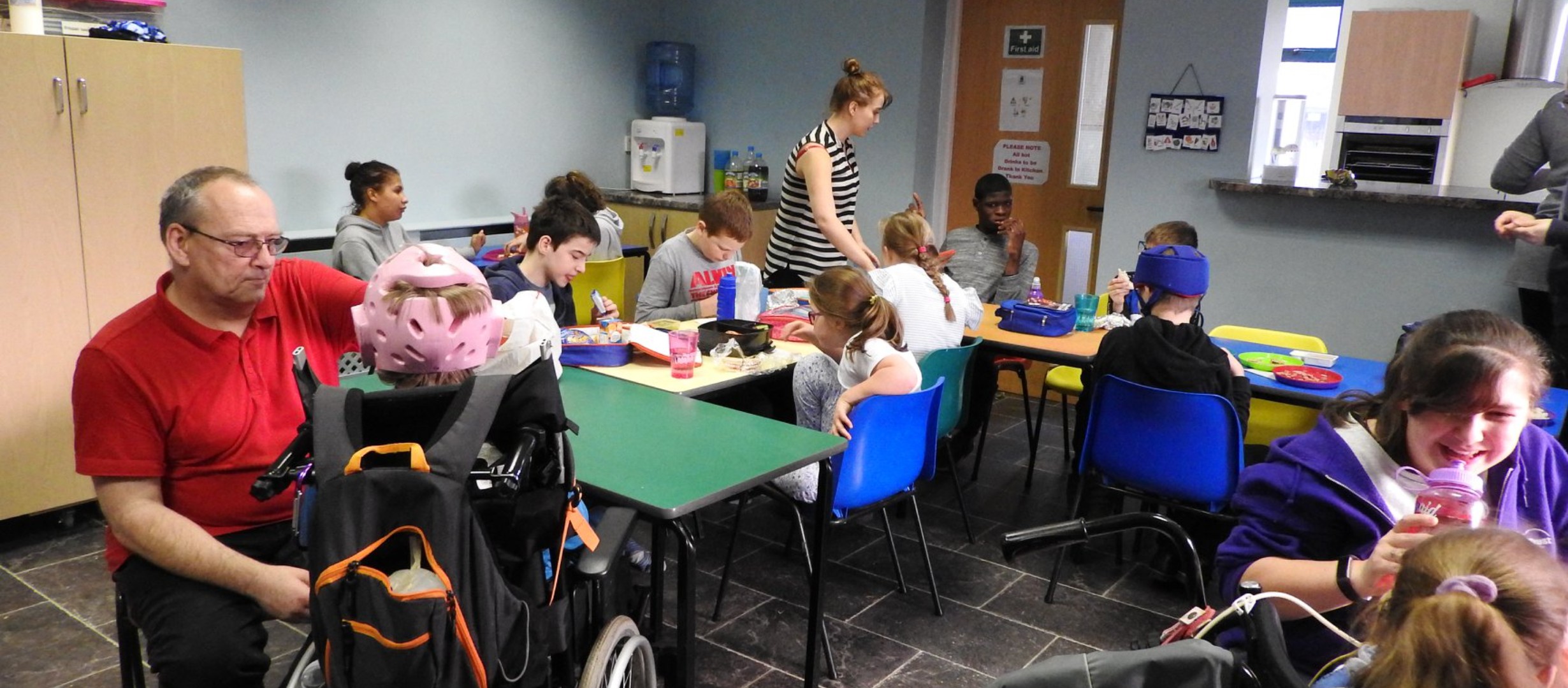 The dining room at the Spring Centre with children eating their lunch