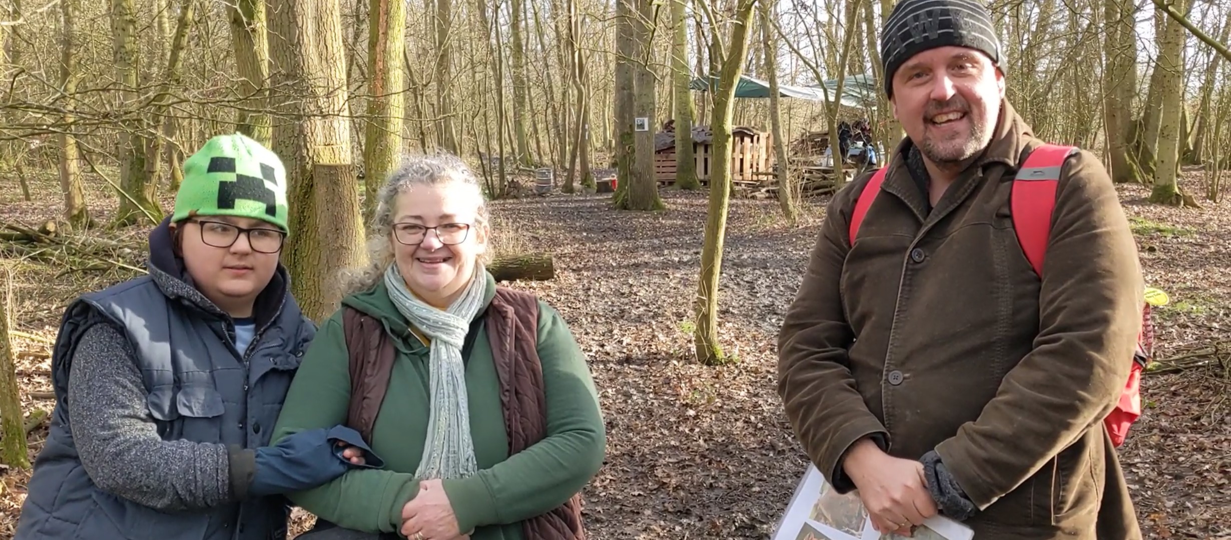 A family enjoying their day in the WAM Woods