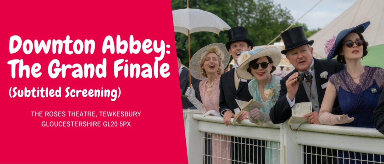 A group of elegantly dressed individuals is gathered at an outdoor event, smiling and waving enthusiastically. They are wearing formal attire, including top hats and large hats adorned with decorations. The scene includes a bright pink background with the text 'Downton Abbey: The Grand Finale (Subtitled Screening)' prominently displayed, along with details about the venue: The Roses Theatre, Tewkesbury, Gloucestershire GL20 5PX.