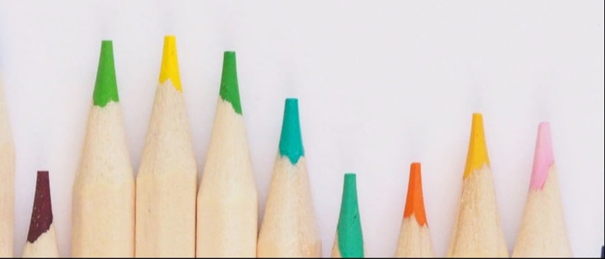 A photo of coloured pencils on a white background.