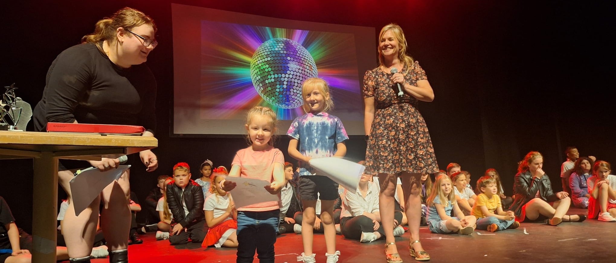 Shining Stars receiving awards on the Roses Stage