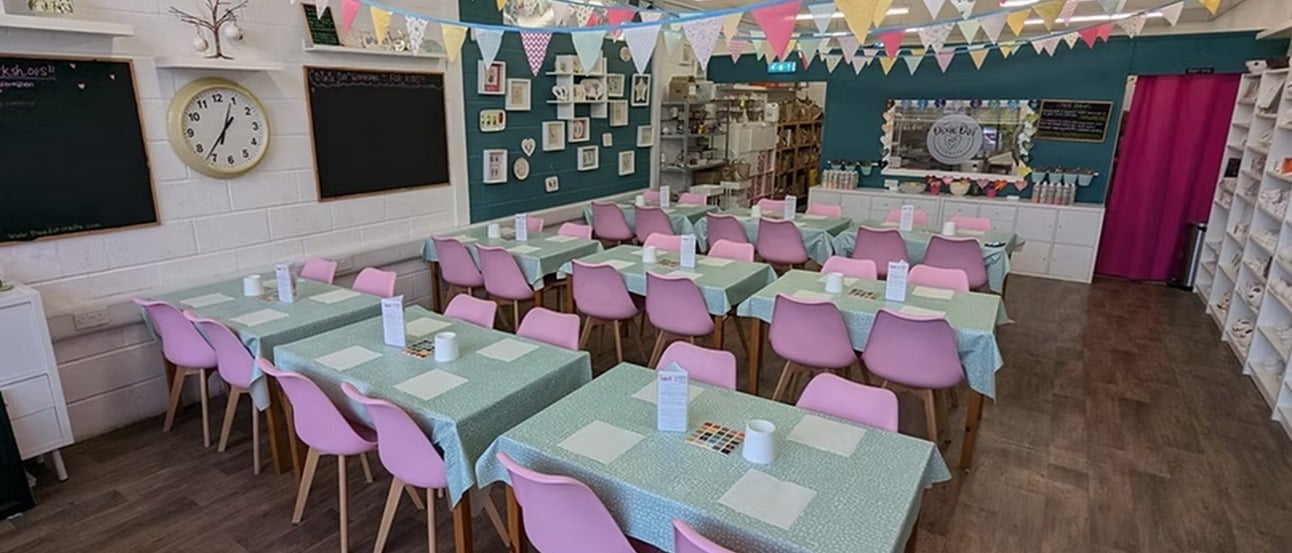 banner showing crafting space with tables and chairs