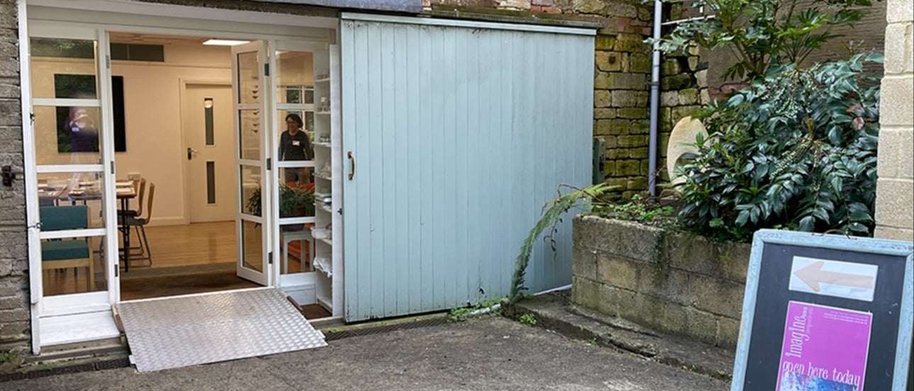a photo looking in on the art studio